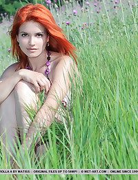 Amidst the jilted grass, and delicate lavander flowers, a ravishing Viola showcases her natural beauty with engagingly carefree and uninhibited poses that reminds us of lazy summer afternoons.